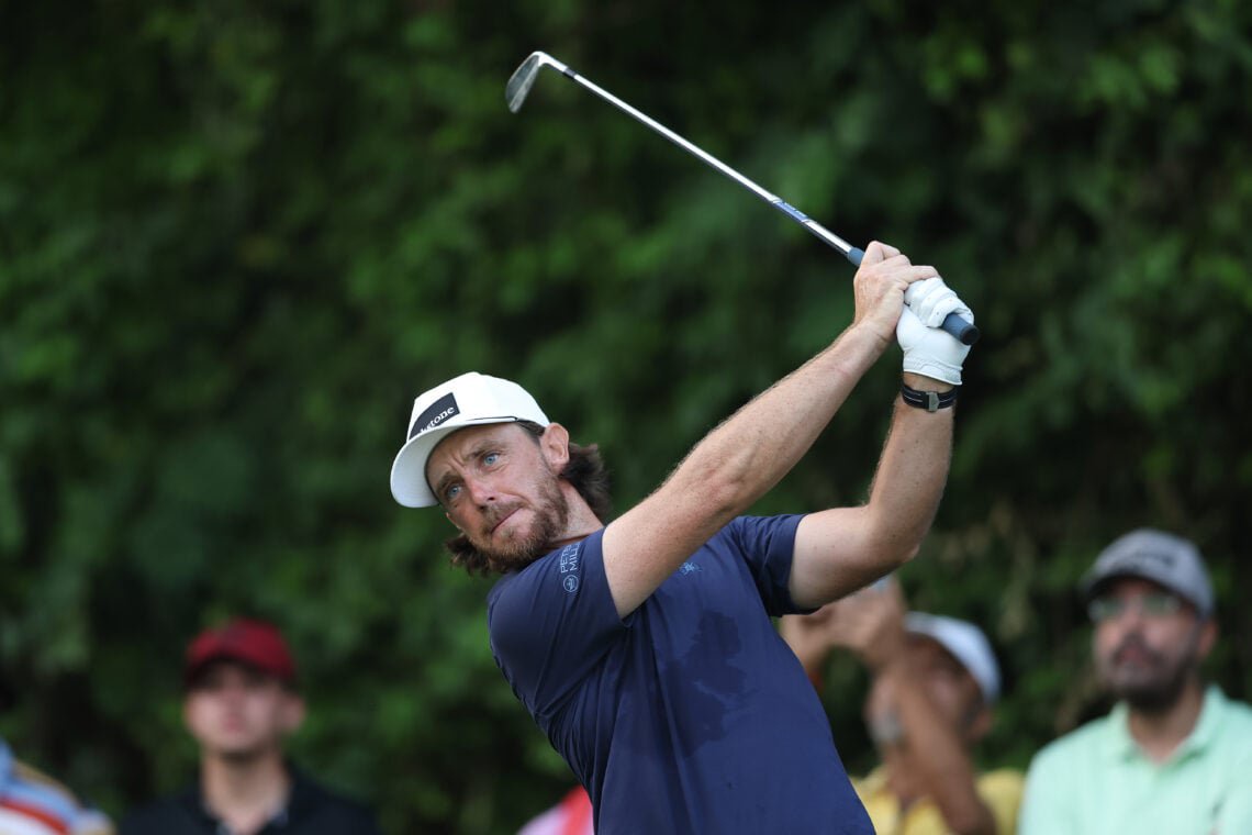 Tommy Fleetwood hits an iron shot during the second round of the DP World India Championship