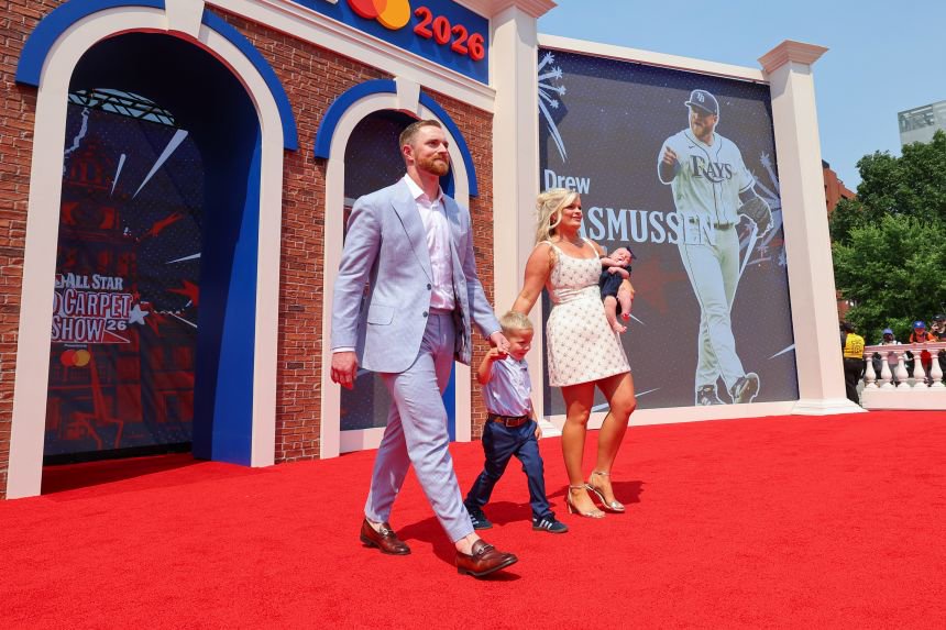 The Rasmussen family walks the red carpet together ahead of the All-Star Game in July.