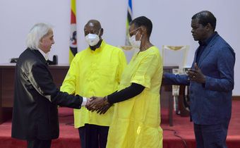Pastor Benny Hinn prays for President Museveni and his wife Janet