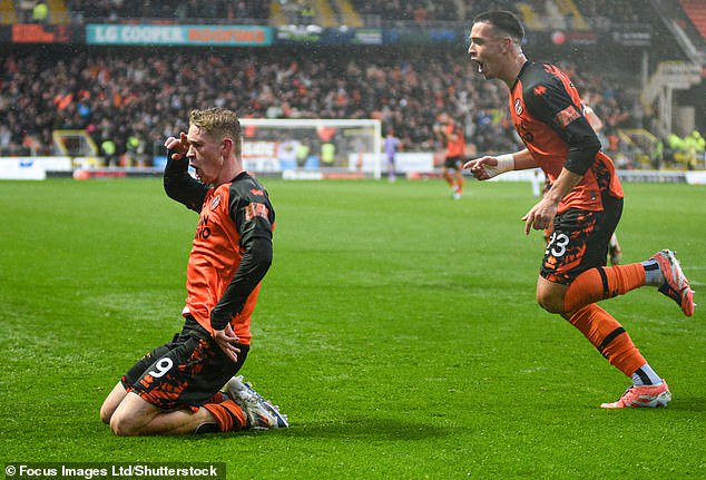 Zac Sapsford savours the moment after scoring the winner in Dundee United's 3-2 victory