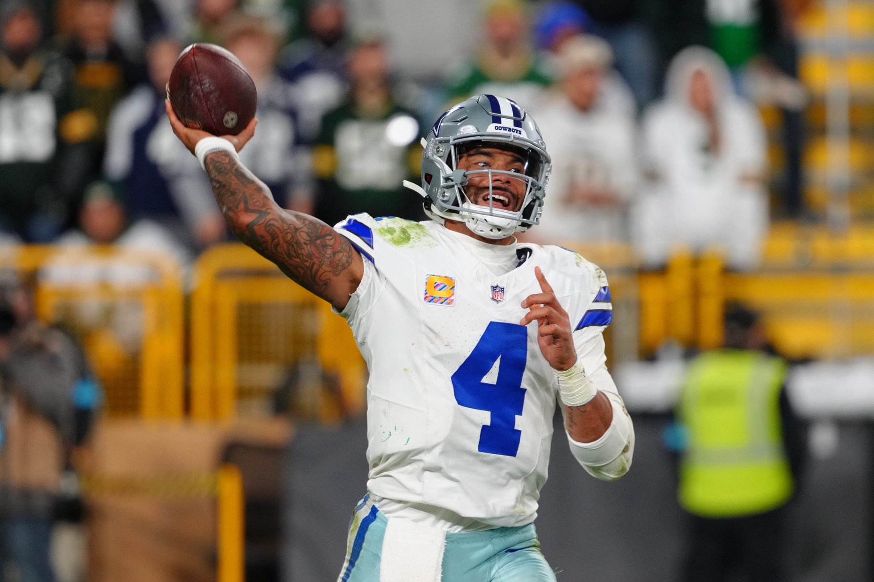 Oct 18, 2026; Green Bay, Wisconsin, USA;  Dallas Cowboys quarterback Dak Prescott (4) passes against the Green Bay Packers during the second half at Lambeau Field.  Mandatory Credit: Ross Harried-Imagn Images