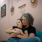 A freed Israeli hostage waits with hope for her husband, still held by Hamas in Gaza