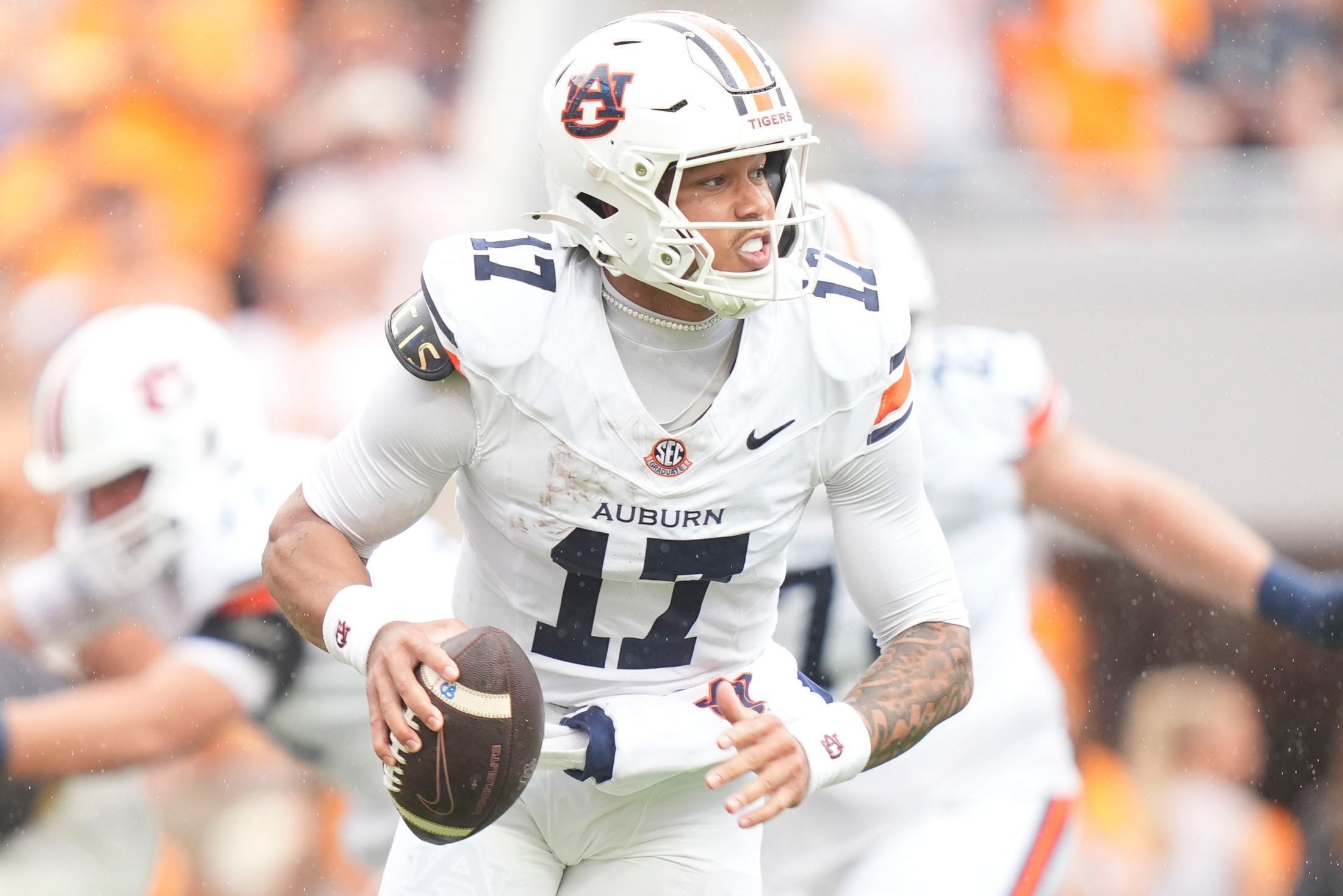 Auburn quarterback Byrum Brown (17) looks for an open receiver during a college football against Tennessee on Oct. 3, 2026, in Knoxville, Tennessee.