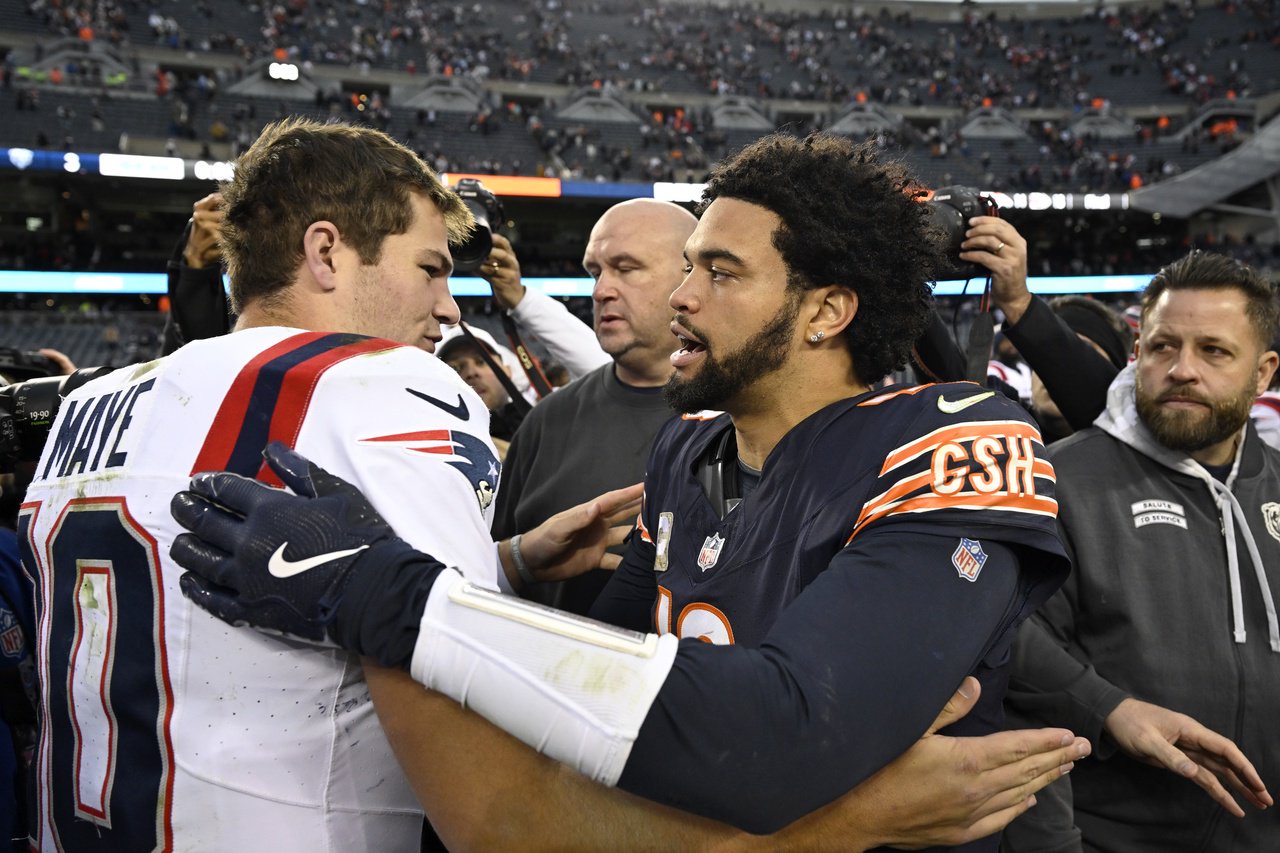 Caleb Williams of the Chicago Bears and Drake Maye of the New England Patriots greet each other after a 2024 game. (Photo by Quinn Harris/Getty Images)