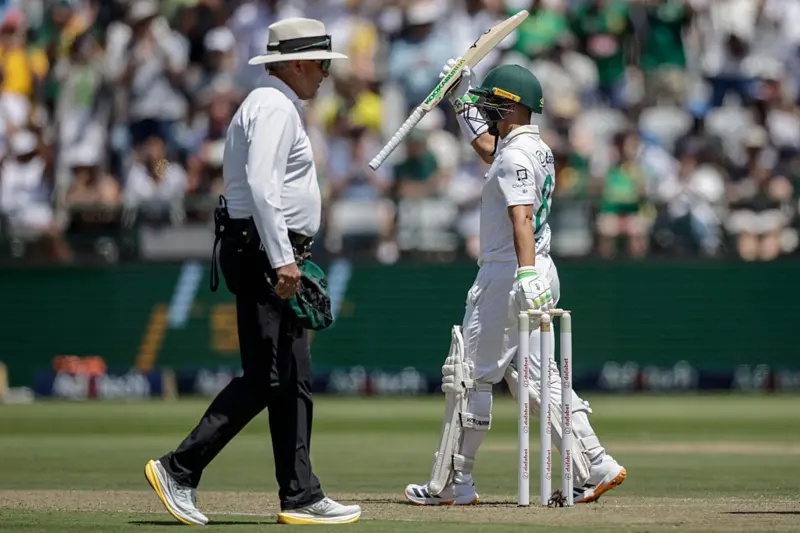 Marques Ackerman raises bat