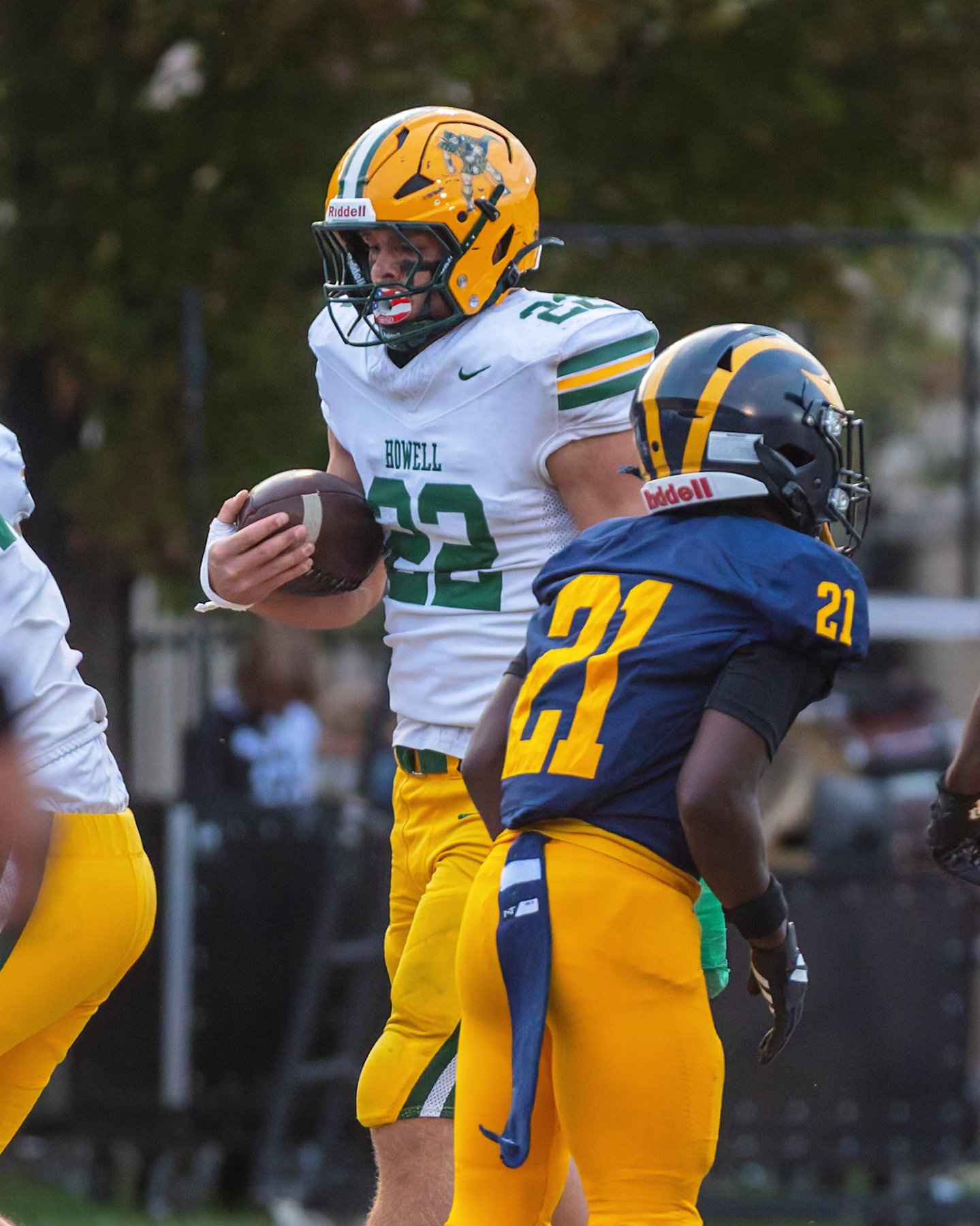 Howell's Bryce Kish (22) celebrates a touchdown during a 43-7 victory over Wayne Memorial Friday, Sep. 25, 2026. (A.M. ARRICK/For The Livingston Daily)