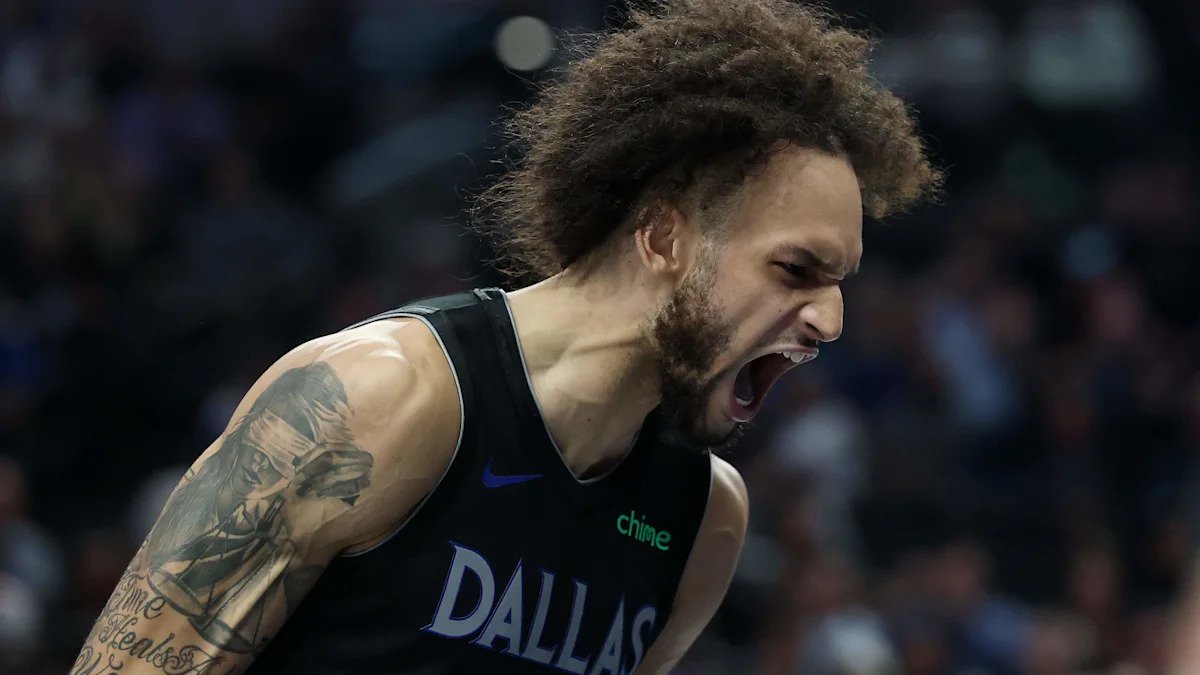 DALLAS, TEXAS - NOVEMBER 19: Dereck Lively II #2 of the Dallas Mavericks reacts to a score by Brandon Williams #10 during the second half of a game against the New York Knicks at American Airlines Center on November 19, 2025 in Dallas, Texas.  NOTE TO USER: User expressly acknowledges and agrees that, by downloading and or using this photograph, User is consenting to the terms and conditions of the Getty Images License Agreement. (Photo by Stacy Revere/Getty Images)