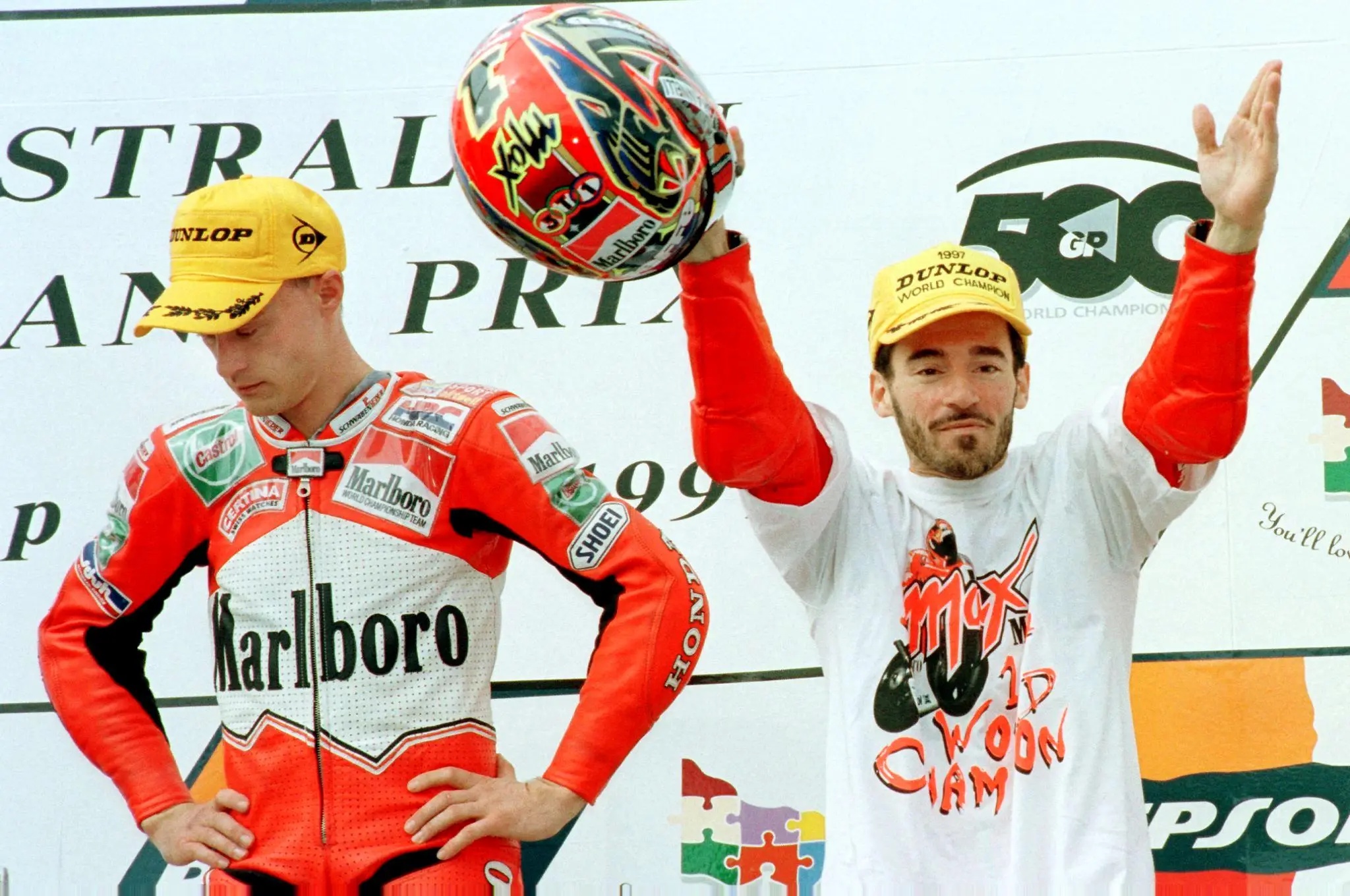 Max Biaggi (right) celebrates after winning the 1997 250cc world championship (Image: Getty)