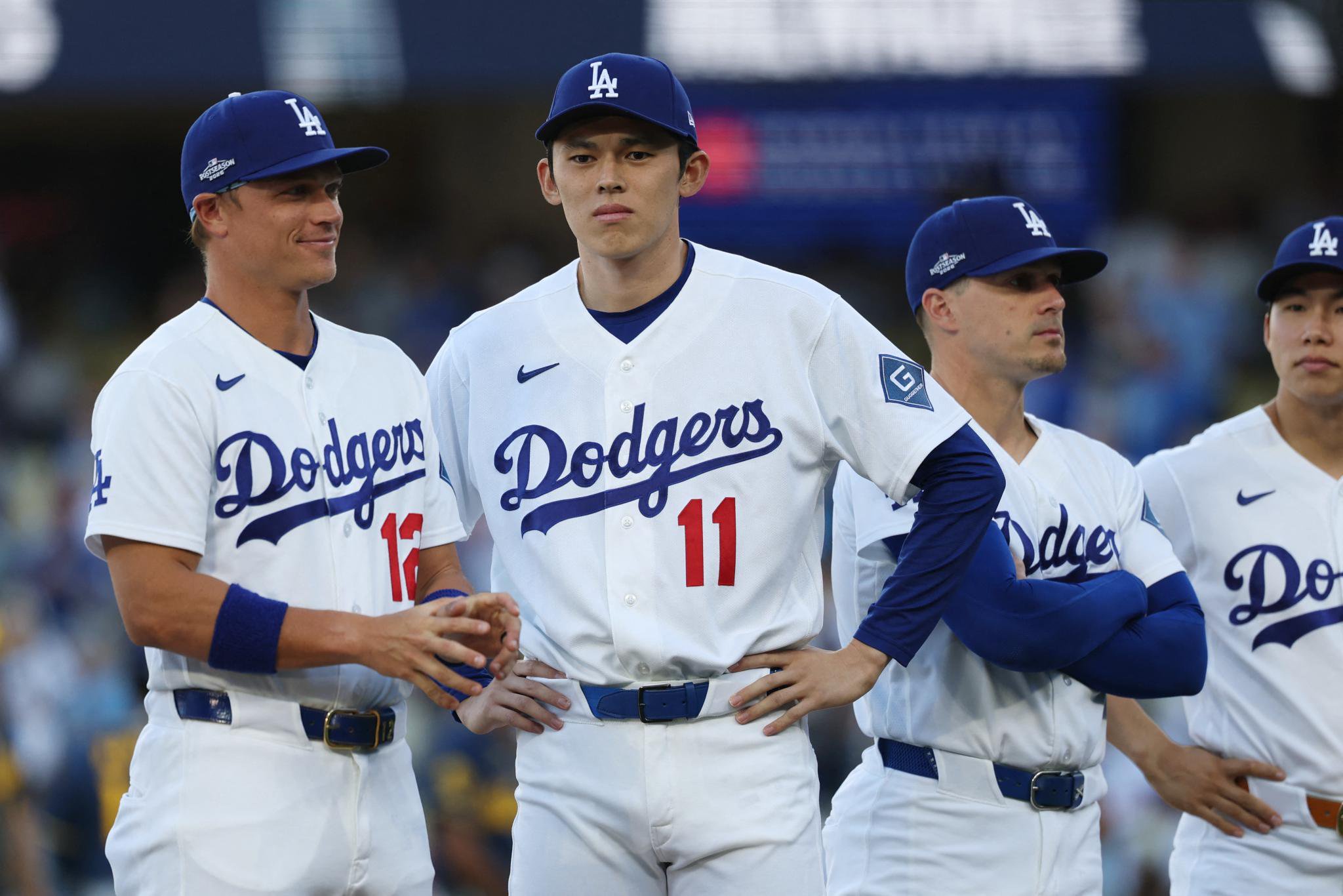 Los Angeles Dodgers pitcher Roki Sasaki (11) stands on the field during the pregame ceremony.