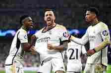Joselu of Real Madrid celebrates scoring his team's first goal with Vinicius Junior and Jude Bellingham during the UEFA Champions League semi-final...