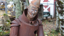 The Tin Man has seen better days as he's now seen covered in rust