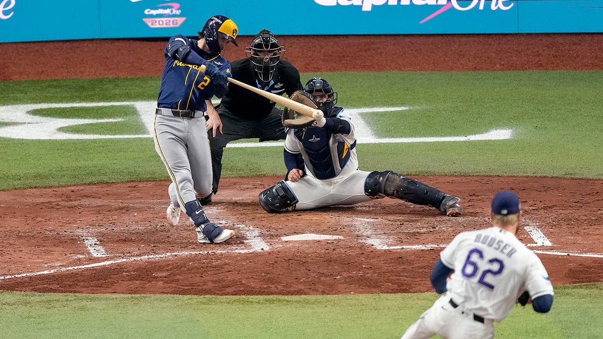 Brice Turang connects for a two-RBI base hit during World Series Game 3.
