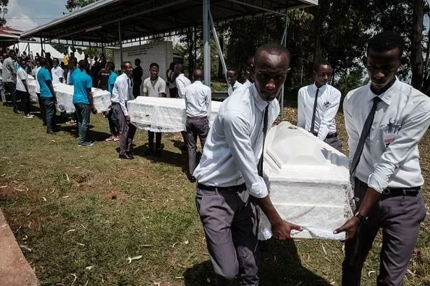 People carrying a coffin
