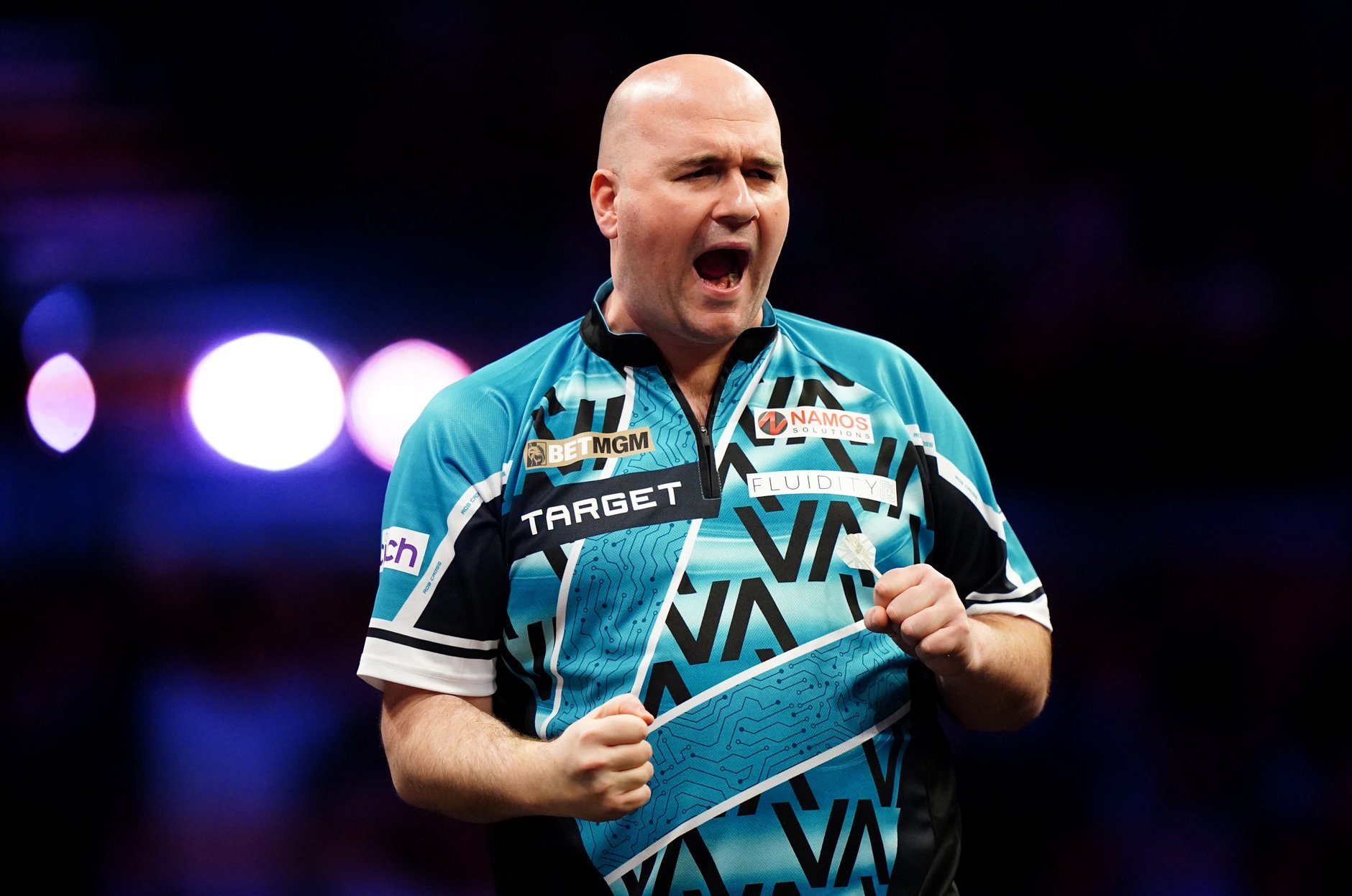 Rob Cross celebrates victory against Luke Humphries in their quarter-final match during night five of the 2025 BetMGM Premier League