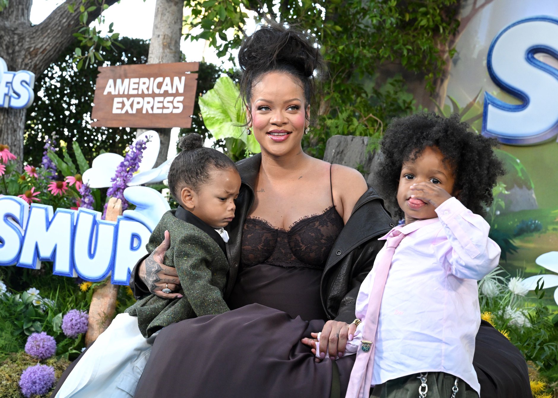 Rihanna with her two children at a Smurfs movie premiere.