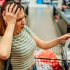 Americans are going into debt to buy groceries. Here's why those balances can be difficult to pay down