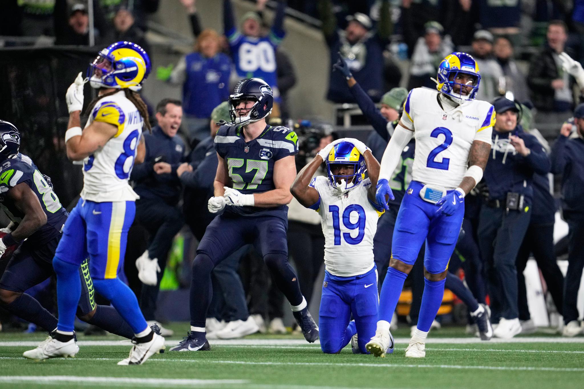 Xavier Smith (19) of the Los Angeles Rams reacts after a fumble recovered by the Seattle Seahawks.