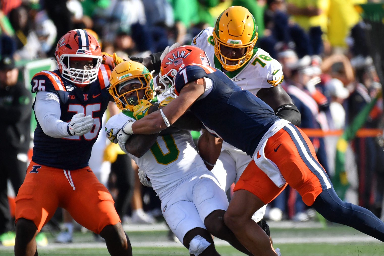 Oct 24, 2026; Champaign, Illinois, USA;  Illinois Fighting Illini defensive back Matthew Bailey (7) tackles Oregon Ducks running back Jordon Davison (0) during the first half at Gies Memorial Stadium.  Mandatory Credit: Ron Johnson-Imagn Images