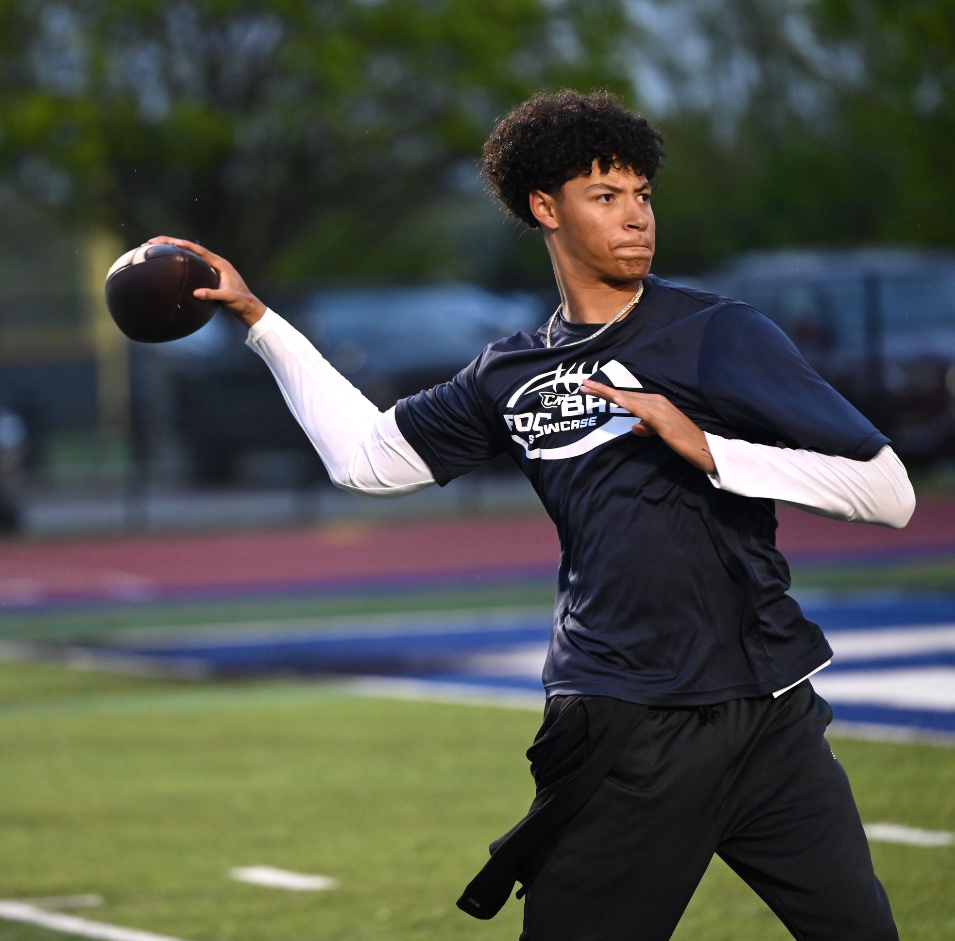 St. John's Prep quarterback Chris Vargas loads up a pass at the Catholic Conference Football Showcase at Xaverian Brothers in Westwood on Thursday.