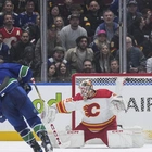 Tyler Myers, Thatcher Demko help Canucks beat Flames 4-1 to clinch Pacific Division title