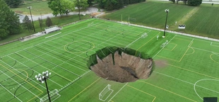 Massive sinkhole collapses soccer field at Illinois park