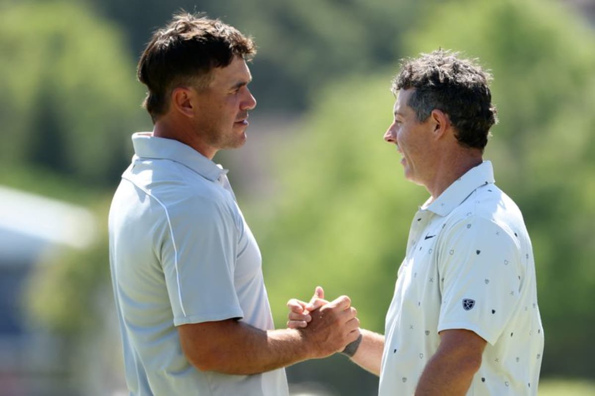 Brooks Koepka and Rory McIlroy shake hands