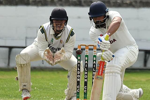 Mosun Hussain hit a half century in vain in Woodlands' defeat to Bradford & Bingley.