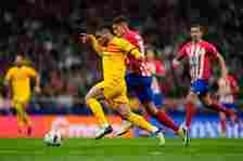 Vitor Roque centre-forward of Barcelona and Brazil and Nahuel Molina right-back of Atletico de Madrid and Argentina compete for the ball during the...