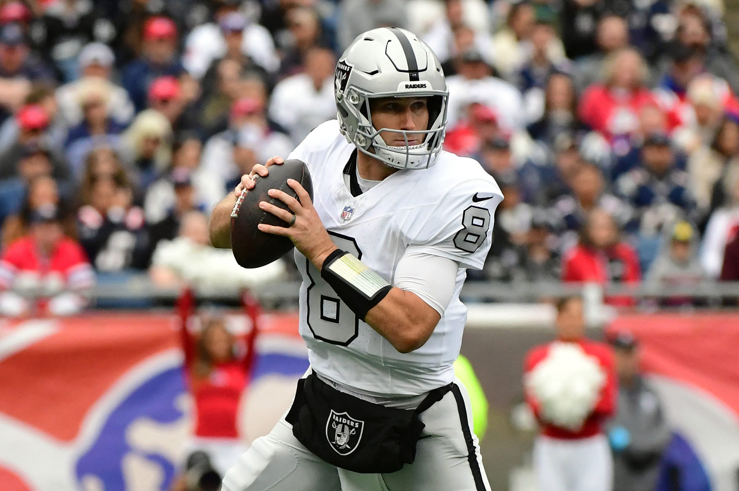 Oct 11, 2026; Foxborough, Massachusetts, USA;  Las Vegas Raiders quarterback Kirk Cousins (8) drops back to pass against the New England Patriots during the second quarter at Gillette Stadium.  Mandatory Credit: Bob DeChiara-Imagn Images