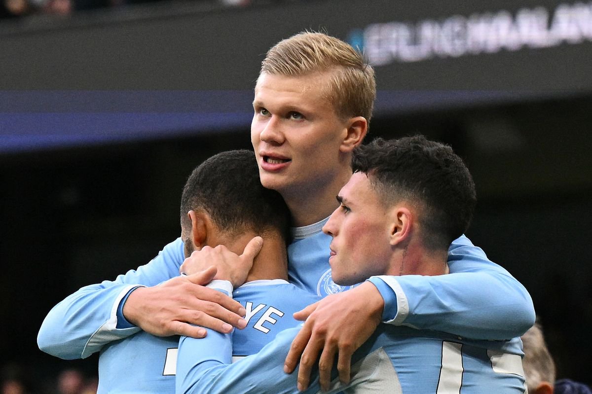 Manchester City's Erling Haaland centre, alongside Iliman Ndiaye and Phil Foden