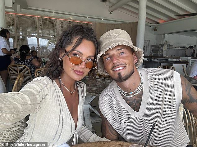 Milly and Ben are pictured living it up on holiday