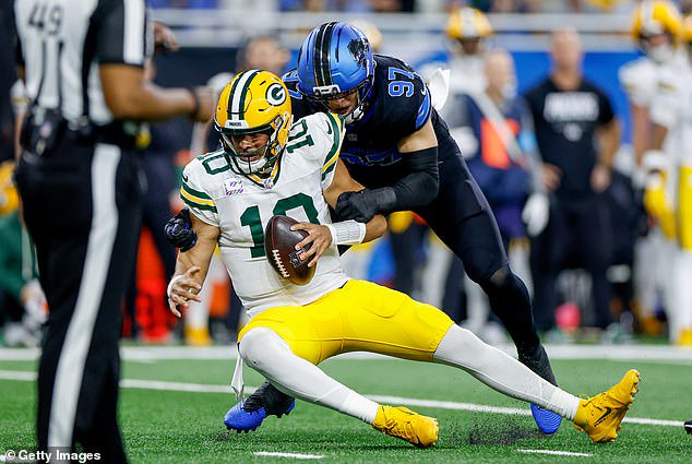 Aidan Hutchinson sacks Jordan Love on Sunday in Detroit. Officials did not flag this hit
