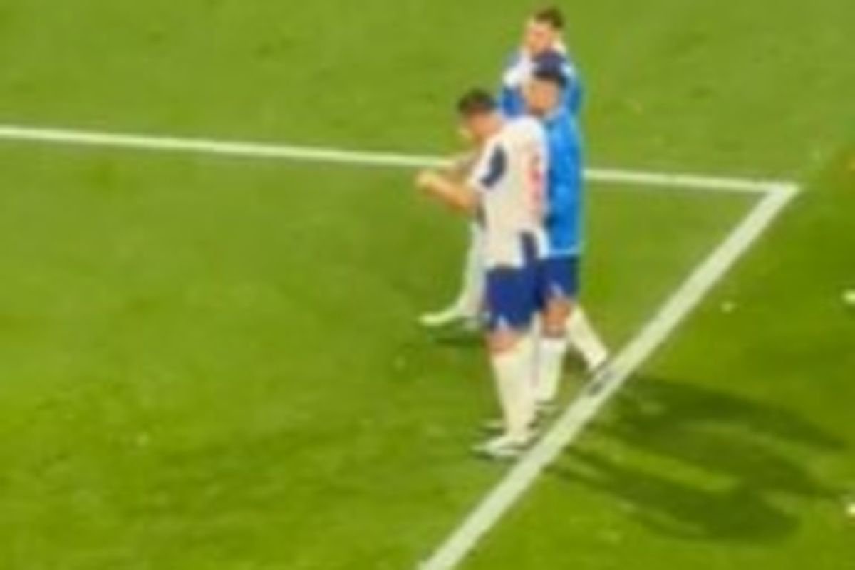 Porto defender Jakub Kiwior arguing with Porto fans after the club's 1-0 loss to PSV Eindhoven in the Champions League