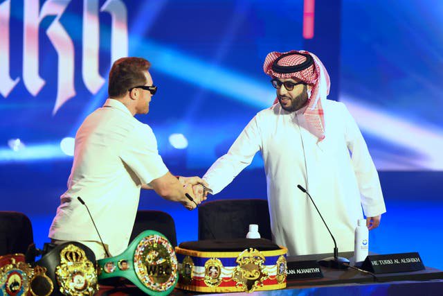 Canelo Alvarez (left) with Saudi adviser and boxing matchmaker Turki Alalshikh