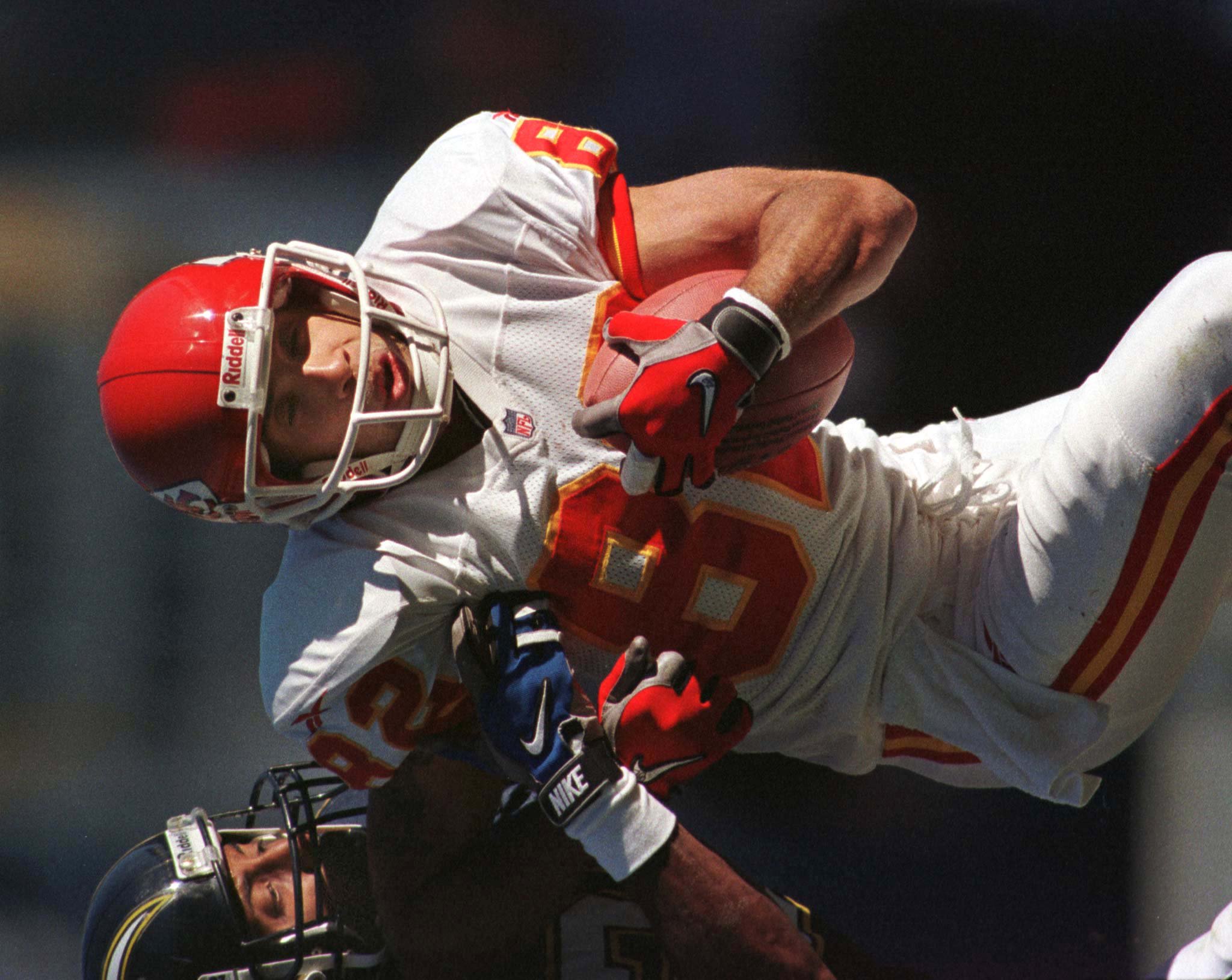 Kansas City Chiefs receiver Derrick Alexander heads downfield, evading San Diego Chargers safety Greg Jackson, after catching a 31-yard pass from Chiefs quarterback Rich Gannon in the second quarter November 22 in San Diego.

JTL/RC/WS
