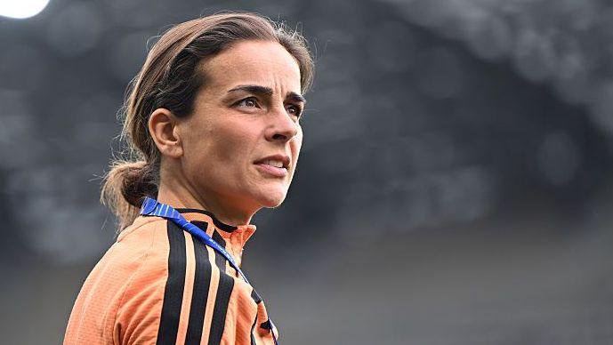 A picture of Renee Slegers looking thoughtful