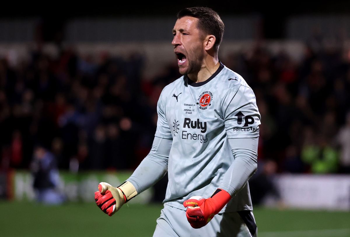 Jay Lynch of Fleetwood Town celebrates saving Arsenal's fourth penalty taken by Bruno Guimaraes in the penalty shootout during the Carabao Cup Fourth Round match between Fleetwood Town and Arsenal at Highbury Stadium on October 27, 2026