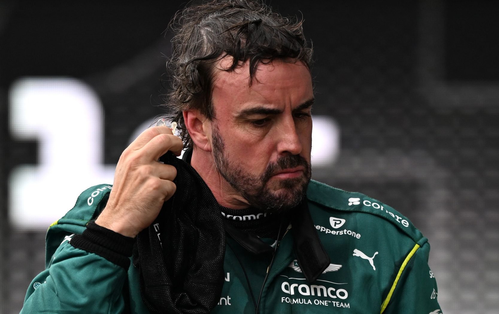 Fernando Alonso looks dejected