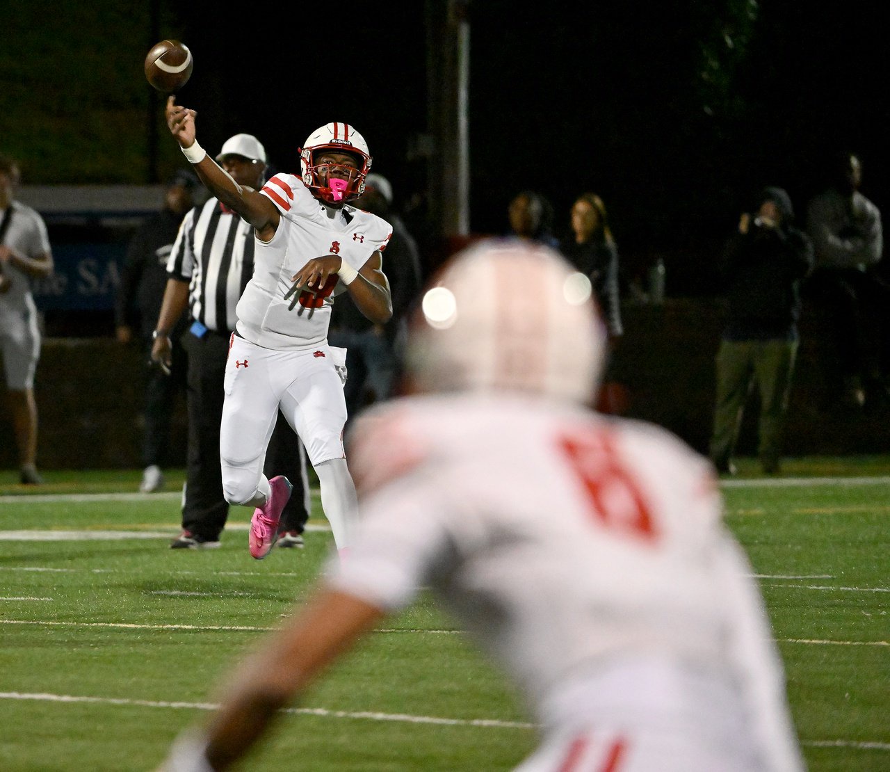 Archbishop Spalding Cavaliers Brian Snowden Jr. #9 completes a big pass to  Myles McAfee #8 during the second quarter. The Archbishop Spalding Cavaliers visit the St. Mary\xe2\x80\x99s Saints in a high school football matchup Friday evening. (Paul W. Gillespie/Staff)