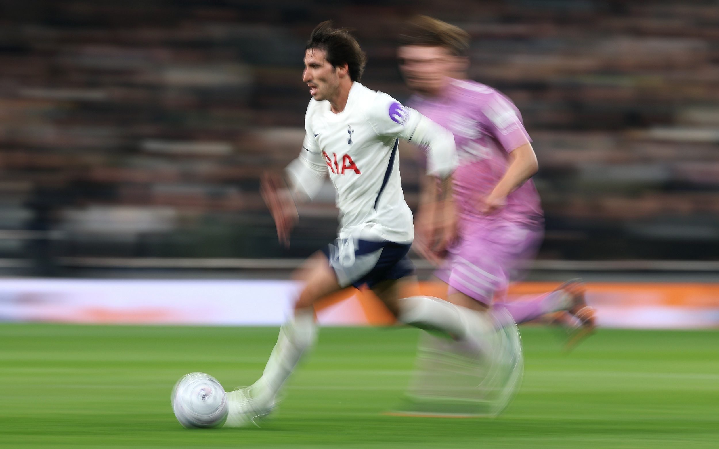 Sandro Tonali of Tottenham Hotspur runs with the ball