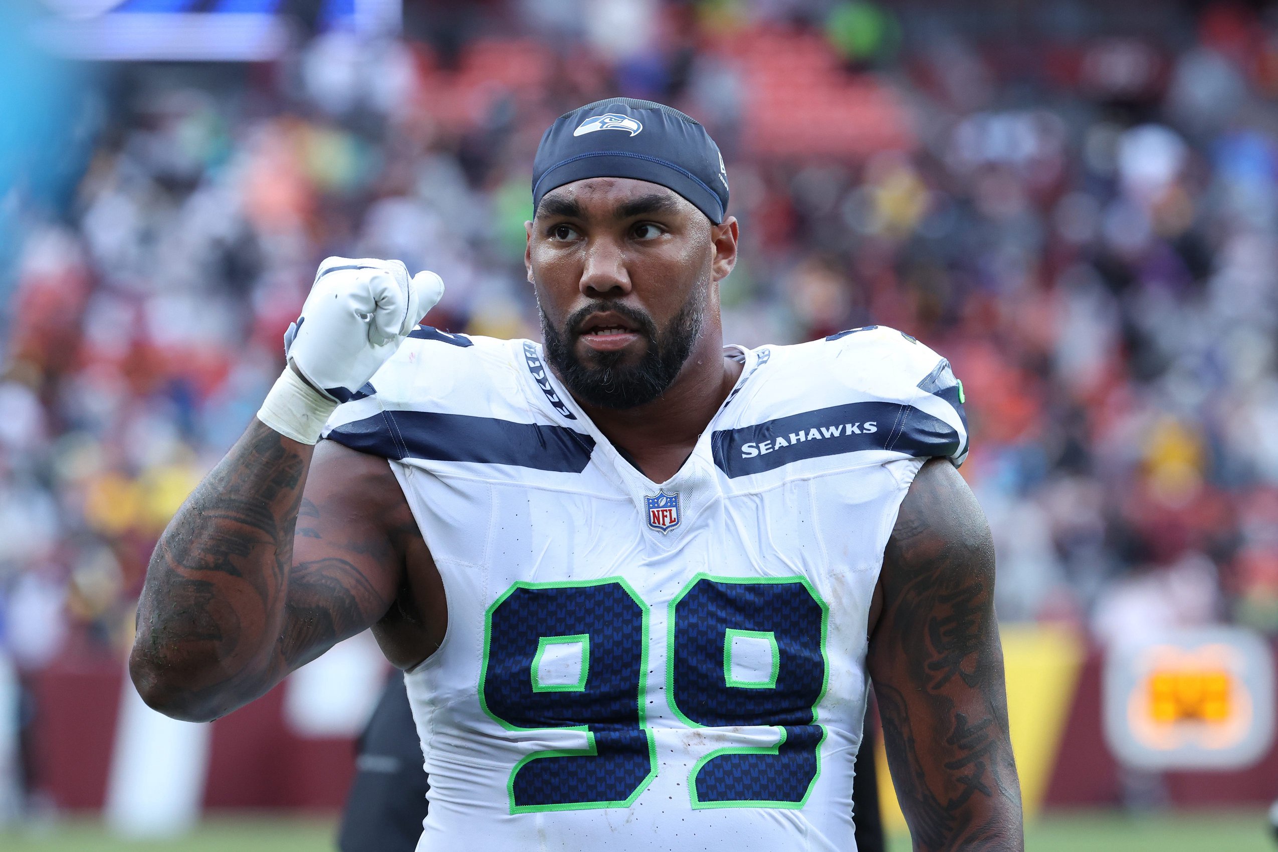 Sep 27, 2026; Landover, Maryland, USA; Seattle Seahawks  defensive tackle Leonard Williams (99) looks on during the first half against the Washington Commanders at Northwest Stadium. Mandatory Credit: Amber Searls-Imagn Images