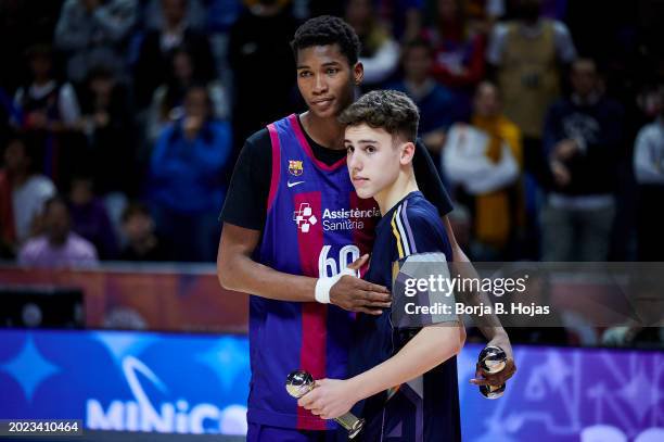 Malaga spain mohamed dabone of fc barcelona and pablo meraof real madrid with the best five