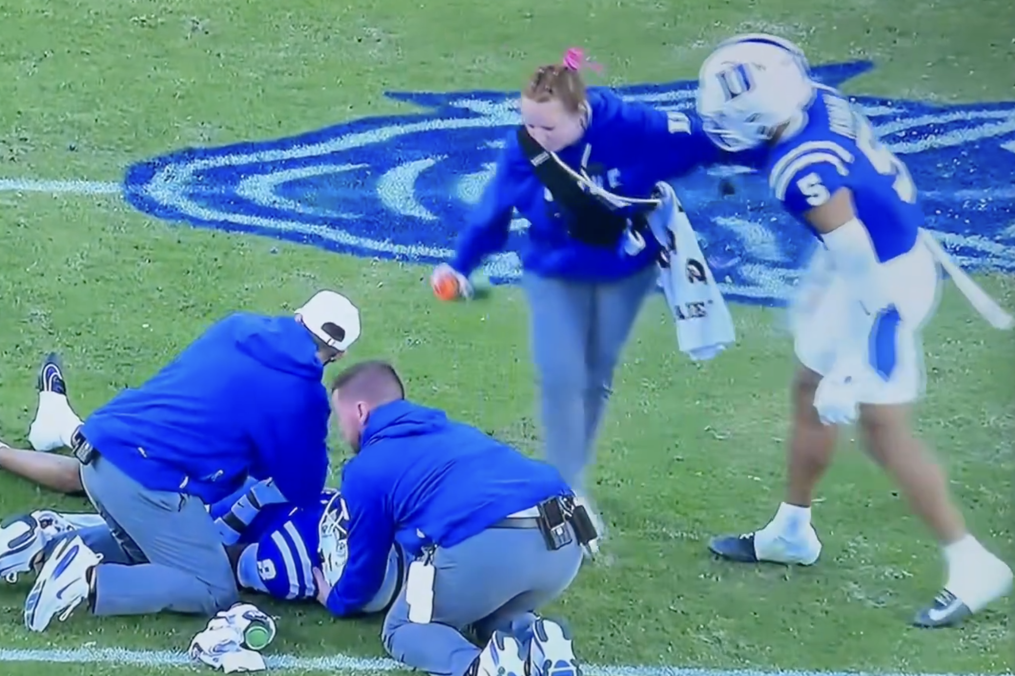 Duke's Kimari Robinson pushes staffer away.