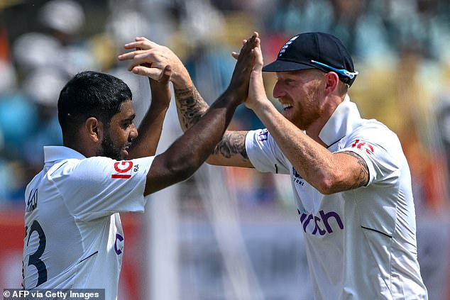 Ahmed celebrates with Ben Stokes after taking a wicket during England's tour of India in 2024