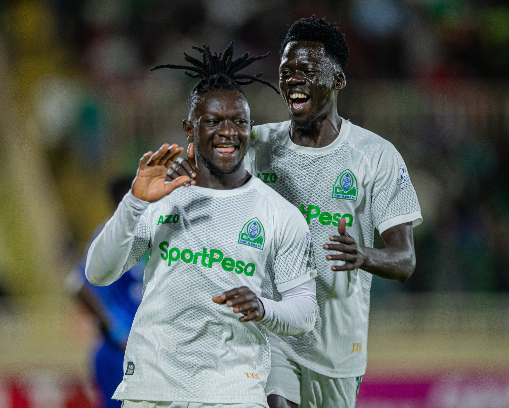 Shariff Musa celebrates with Jackson dwand after scoring for Gor Mahia