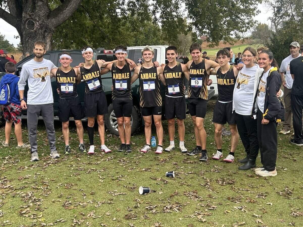 Andale’s boys cross country team celebrates the first state championship in program history after edging Wamego by three points to win the Class 4A title Saturday at Wamego Country Club.