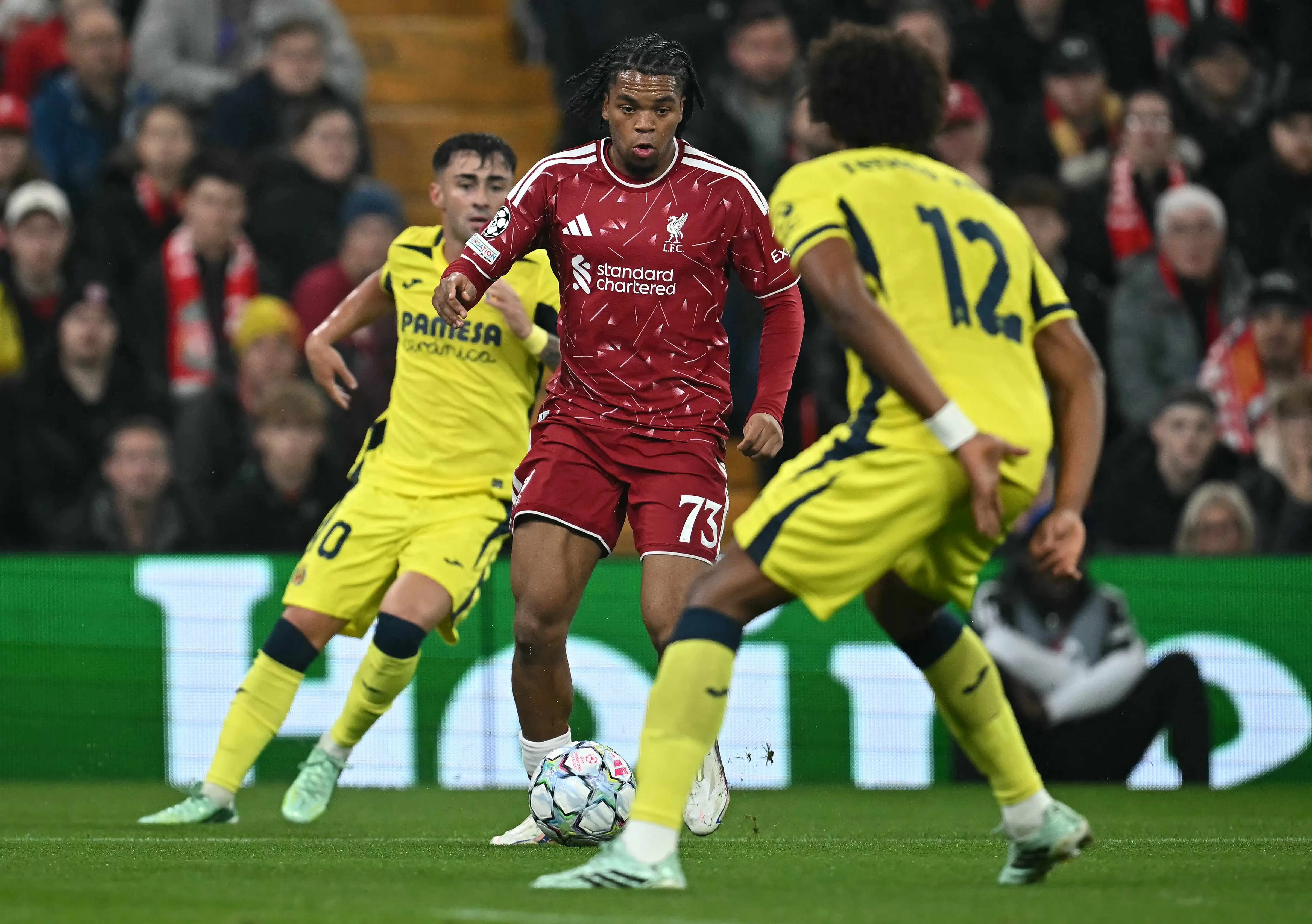 Liverpool's English striker Rio Ngumoha vies with Villarreal's Portugese defender #12 Renato Veiga during the Uefa Champions League football match between Liverpool and Villareal at Anfield in Liverpool, north west England 