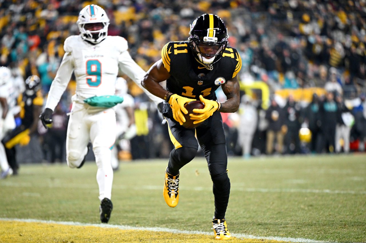 Marquez Valdes-Scantling #11 of the Pittsburgh Steelers scores a touchdown in the third quarter of the game against the Miami Dolphins at Acrisure Stadium on December 15, 2025 in Pittsburgh, Pennsylvania.