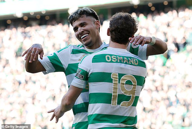 Callum Osmand celebrates with Camilo Duran after scoring Celtic's third goal against Hearts
