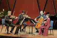 L to R, violinists Curt Thompson and Jun Iwasaki, cellist Brant Taylor and violist Joan...